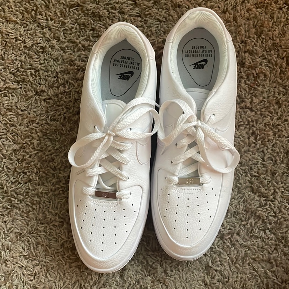 NIKE AIR FORCE ONES Size 10.5 men’s size 12 women’s!